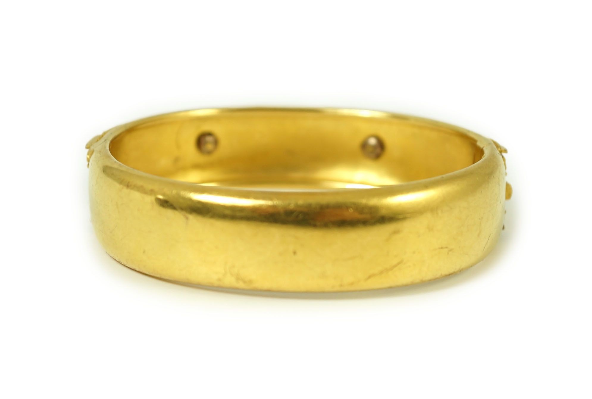 A late Victorian 15ct gold coral bead and seed pearl set part cannetile work hinged bangle